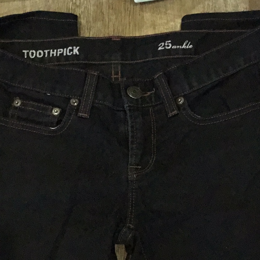 Black with brown thread